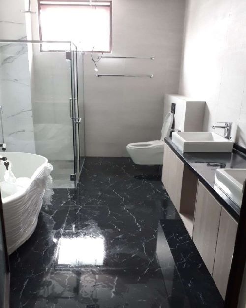 Newly furbished bathroom with sink, toilet, shower and bathtub