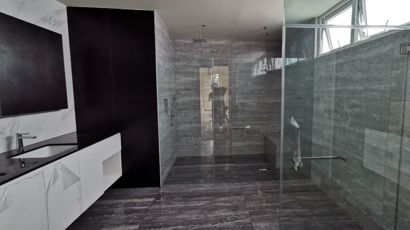 Large bathroom with sink and shower