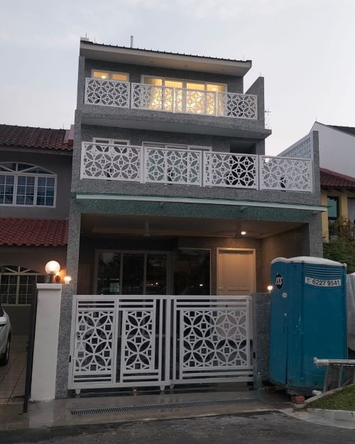 Terrace house with white fence