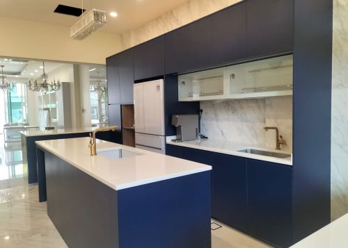 Kitchen with an island and a refrigerator